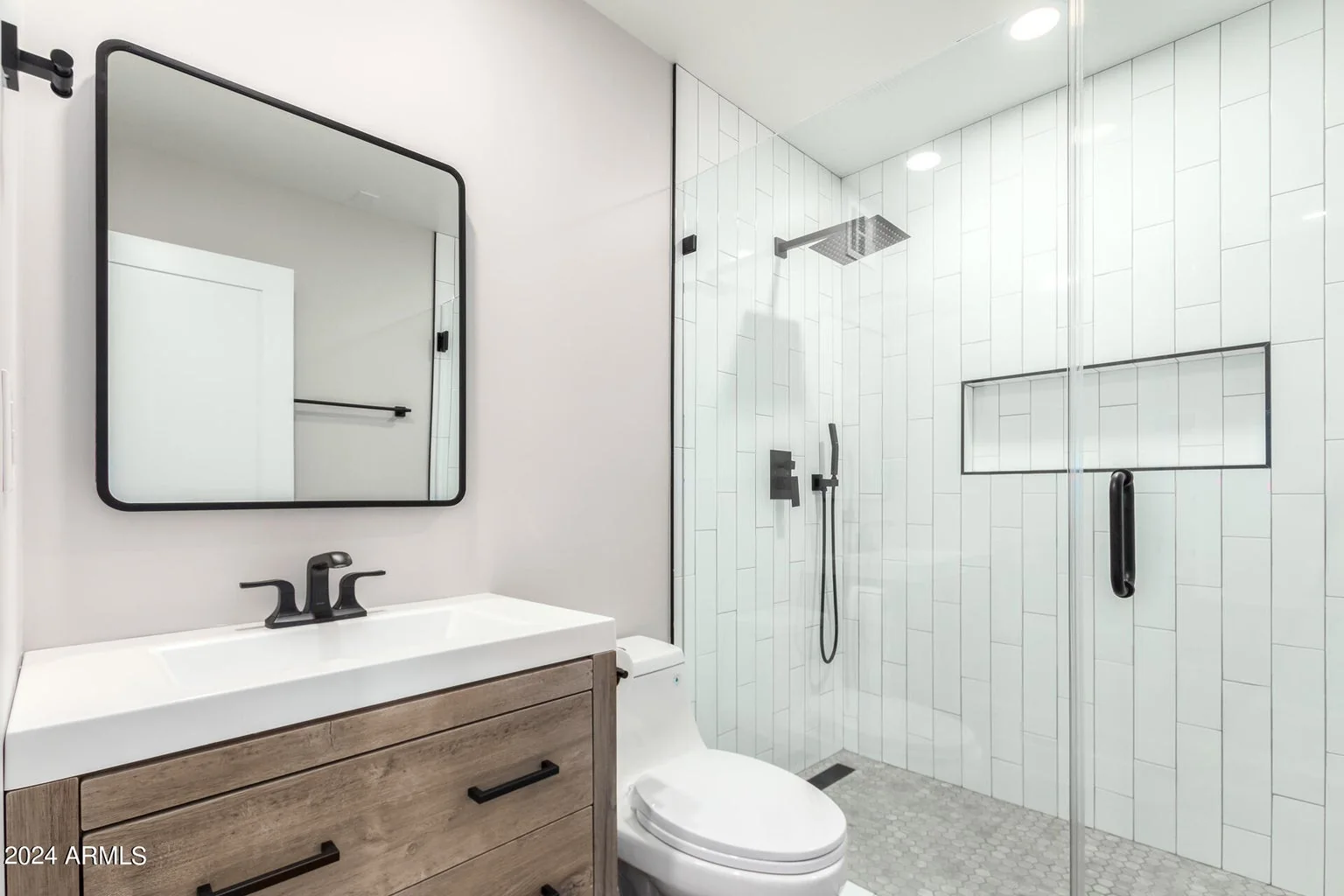 Subway-tile walk-in shower with twin sinks, Surprise AZ
