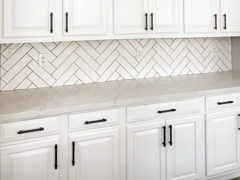 White kitchen with herringbone backsplash, Goodyear AZ