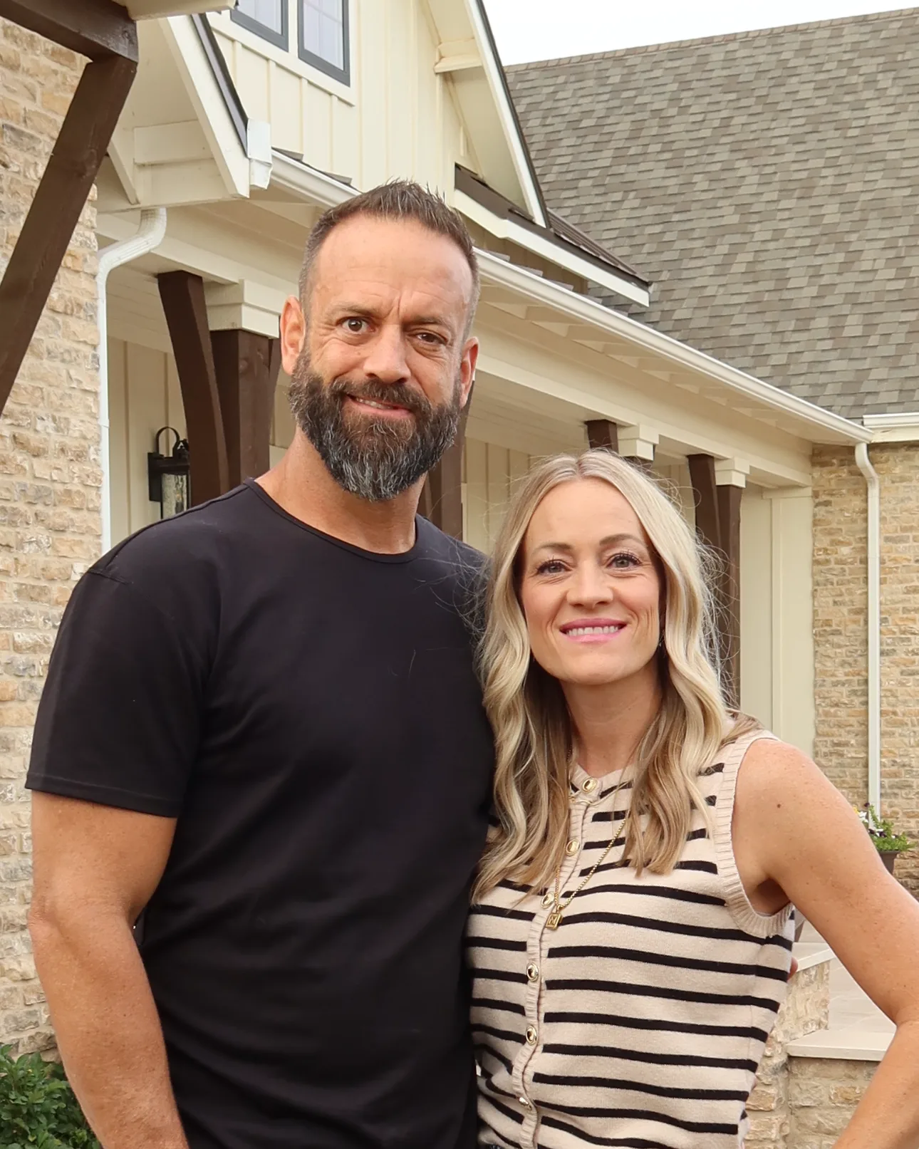 Dan and Jessica Matson, owners of Matson Signature Builders, outside a custom home in Arizona